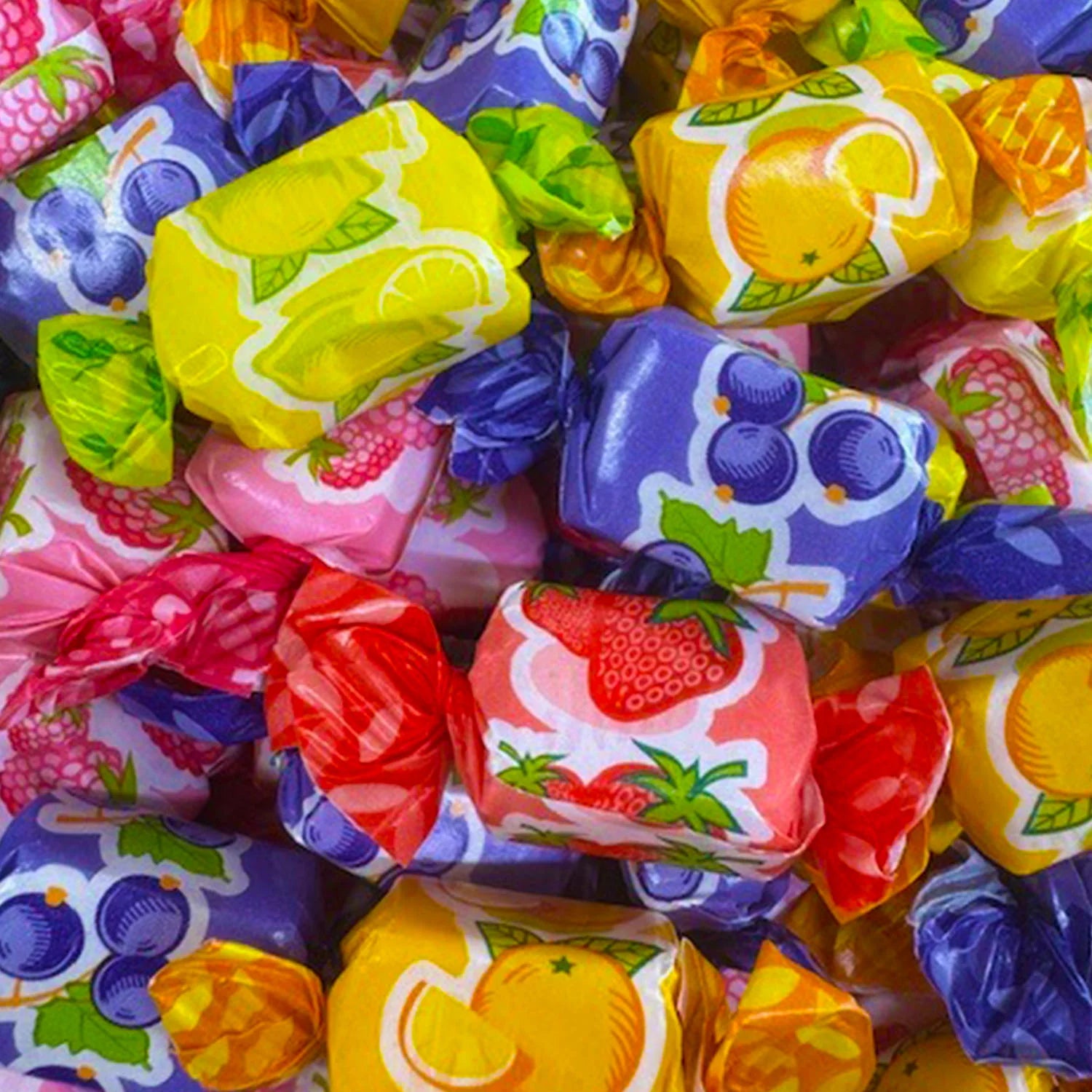 Assorted colorful candy wraps with fruit designs.