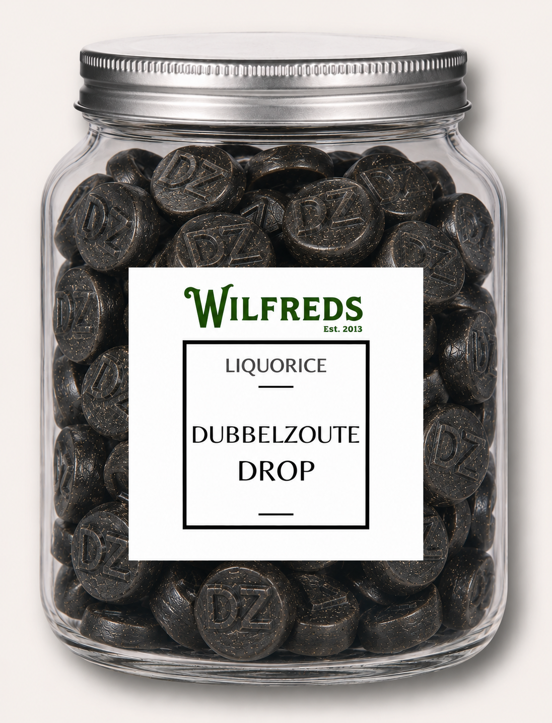 Jar of Wilfreds Dubbelzoute Drop liquorice with a white label on a light gray background