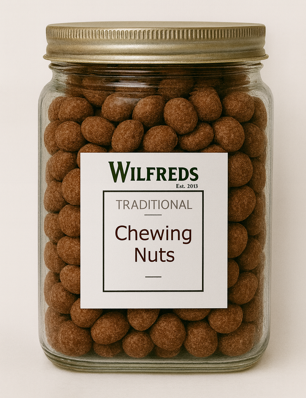 Jar of Wilfreds Traditional Chewing Nuts with a white label on a beige background